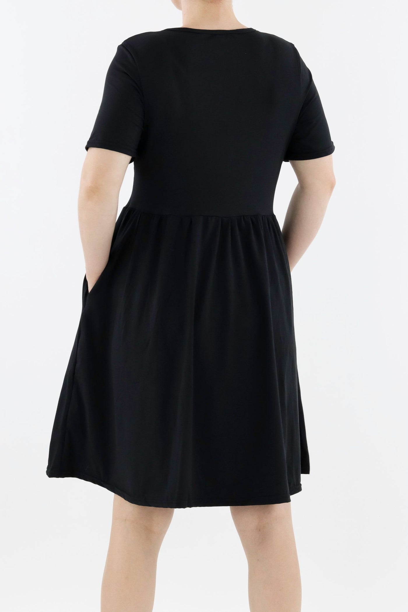 Black - Short Sleeve Skater Dress - Knee Length - Side Pockets Knee Length Skater Dress Pawlie   